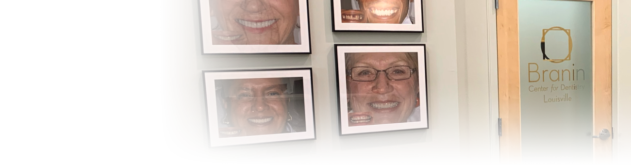 A wall full of framed photos